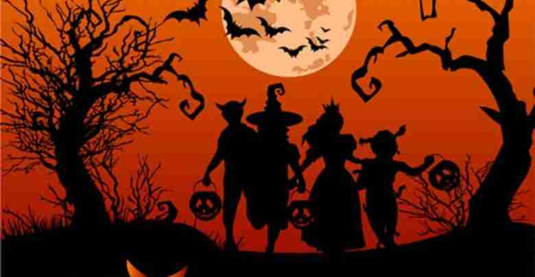 Halloween background with silhouettes of children trick or treat