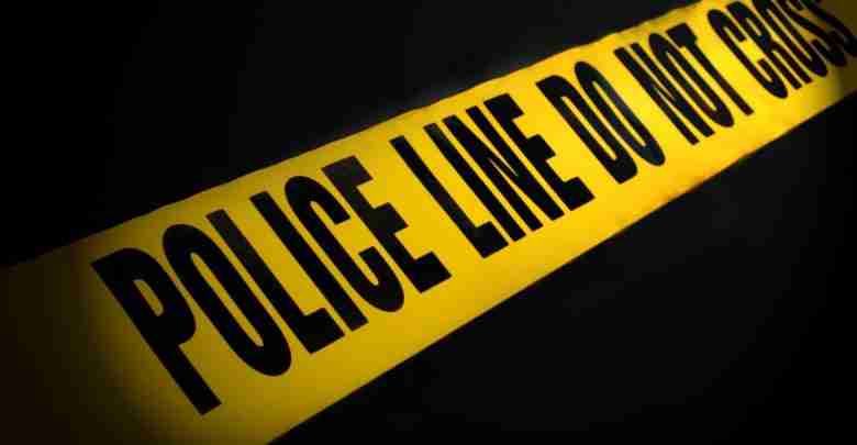 Police Line Tape On Black