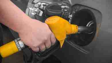 Pumping Gas At Gas Pump.