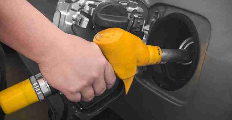 Pumping Gas At Gas Pump.