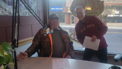 Charles City VFW's Denny Hull and KCHA's Mark Pitz